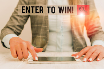 Conceptual hand writing showing Enter To Win. Concept meaning exchanging something value for prize...