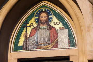 Obraz premium Jesus Christ holding book with Latin inscription Ego Sum Ostium meaning I am the gate, Emmaus monastery Na Slovanech, Abbey Church of the Blessed Virgin Mary, St. Jerome and Slavic Saints, Prague, Cze