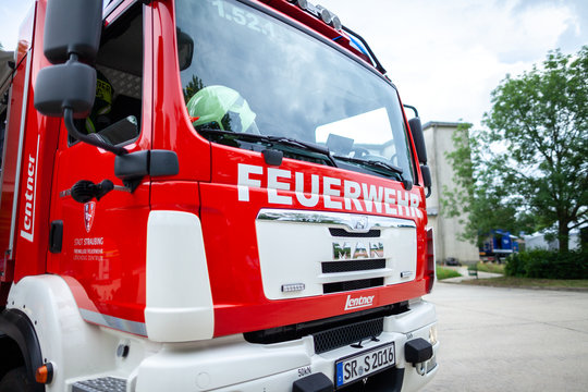 FELDKIRCHEN / Germany - JUNE 9, 2018: German fire engine stands on a platform on open day. The german word Feuerwehr means fire department.