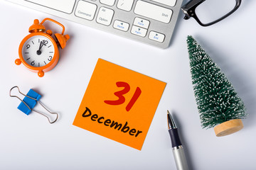December 31st. Image 31 day of december month, calendar on workplace background. New year at work concept