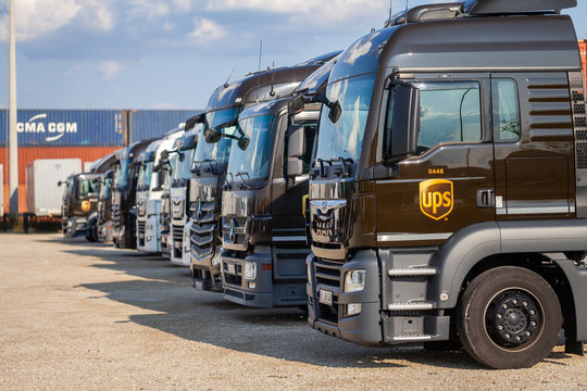 NUREMBERG / GERMANY - AUGUST 4, 2019: Different trucks from the American multinational package delivery, United Parcel Service (UPS), stands near container terminal in Nuremberg.