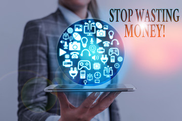 Writing note showing Stop Wasting Money. Business concept for advicing demonstrating or group to...