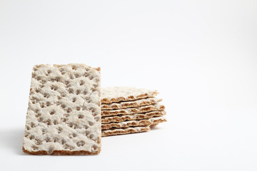 Isolated rye, wheat crisp bread on a white background.