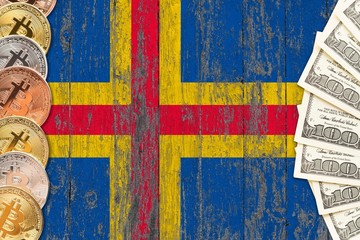 Aland Islands savings concept. Bitcoins and dollar banknotes on the side of national flag with...
