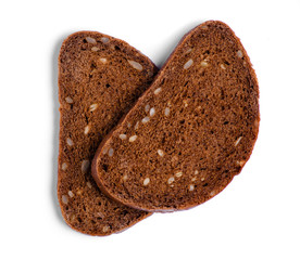 A piece of bread with seeds on white background isolation, top view