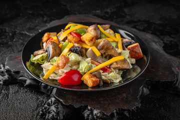 Caesar salad with grilled chicken fillet