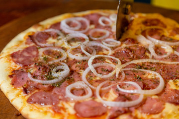 pizza with ham and cheese