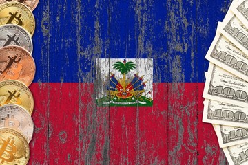 Haiti savings concept. Bitcoins and dollar banknotes on the side of national flag with wooden background. Trading currencies.