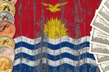 Kiribati savings concept. Bitcoins and dollar banknotes on the side of national flag with wooden background. Trading currencies.