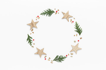 Christmas composition. Star fir branch top view background with copy space for your text. Flat lay.