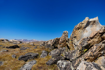 Unusual and colorful rock formations are scattered at the top of the almost 11,000 foot Beartooth Pass