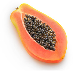 Isolated papaya. Half of fresh papaya fruit with seeds, top view, isolated on white background with clipping path