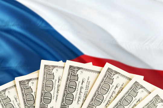 Czech Republic economy concept. Dollar banknotes on the side of national flag with waving background. Financial theme.
