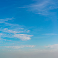 Obraz premium Fantastic clouds against blue sky, square