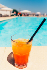orange cocktail at the beach