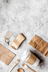 paper bags for food delivery restourant stone table background top view mockup