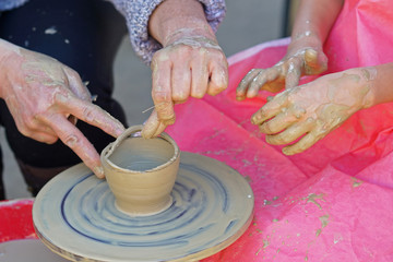 Teaching of ceramics processing to a young student in Bulgaria