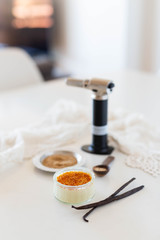 Creme brûlée with raw sugar and blow torch