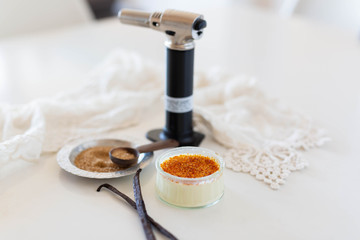 Creme brûlée with raw sugar and blow torch