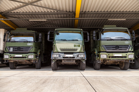 BURG / GERMANY -  JUNE 25 : german military trucks stands under military roof on open day in barrack burg / germany at june 25, 2016.