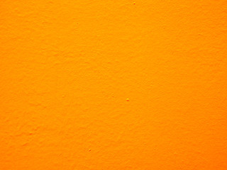 Naklejka premium Colorful concrete yellow painted clean wall background