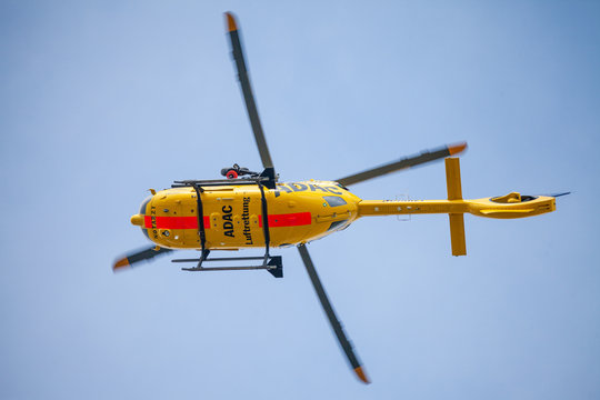 FELDKIRCHEN / GERMANY - JUNE 09, 2018: Eurocopter EC-135 from ADAC Luftrettung flies over landing side. Notarzt means emergency doctor.