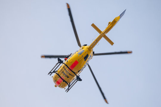 FELDKIRCHEN / GERMANY - JUNE 09, 2018: Eurocopter EC-135 from ADAC Luftrettung flies over landing side. Notarzt means emergency doctor.
