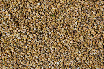 background from small crushed stones laid on ground