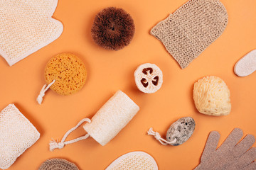 Fototapeta na wymiar Different types of zero waste sponges for body care. Concept of eco friendly supplies for self-care. Flat lay style.