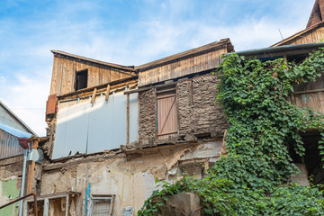 Fototapeta na wymiar Dilapidated courtyard in the back streets of old Tbilisi