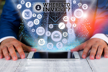 Handwriting text writing Where To Invest Question. Conceptual photo asking about where put money into financial schemes or shares