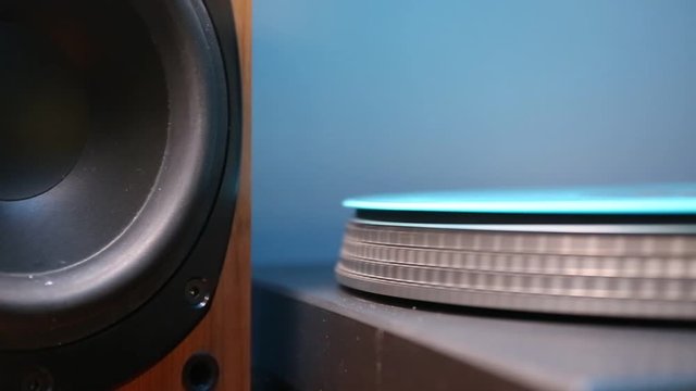 Close up on turntable and loudspeaker vibration.