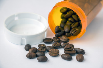 Coffee Beans and pill bottle