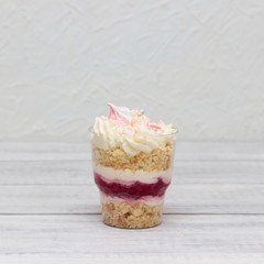 Delicious vanilla dessert with cream cheese and strawberries for the holiday.