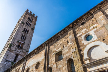 Fototapeta premium San Frediano basilica tower in the ancient town of Lucca, Italy