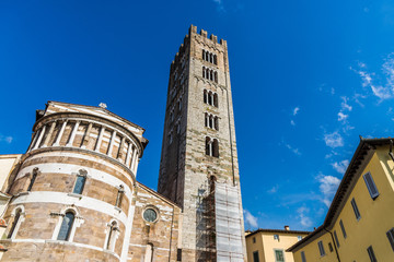 Fototapeta na wymiar San Frediano basilica tower in the ancient town of Lucca, Italy