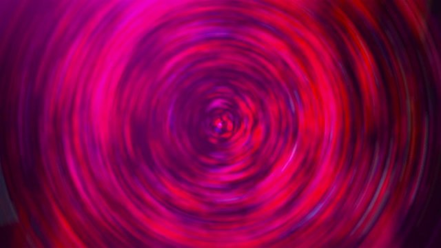 Computer generated backdrop with a radial spin. 3D rendering funnel of colorful particles and waves