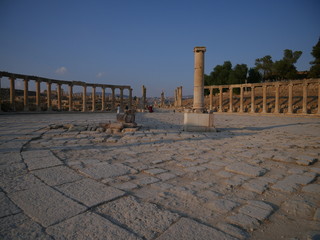 Fototapeta premium Pillars of roman ruins in the historic city of Jerash, Jordan, landscape of constructions build with columns