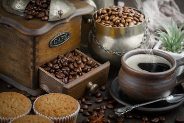 Black coffee on an old background in a cup