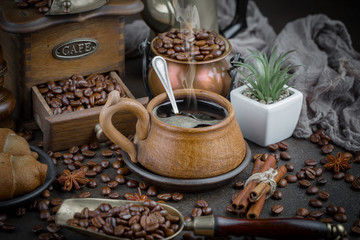 Black coffee on an old background in a cup