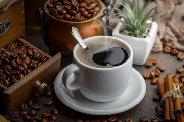 Black coffee on an old background in a cup