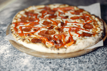 Chef prepare the pizzaa. Man in a white uniform