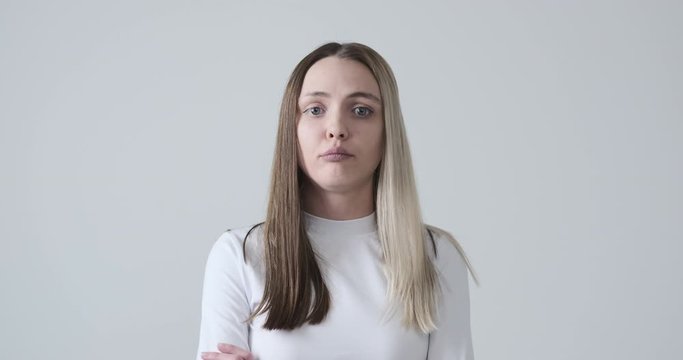 Clueless young woman thinking of solution to her problem