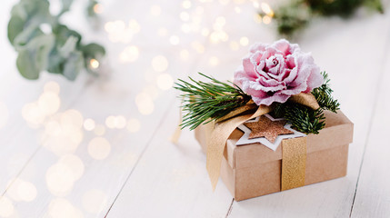 Beautiful, feminine and romantic christmas gift box with bright light background and pastel colors / banner, header