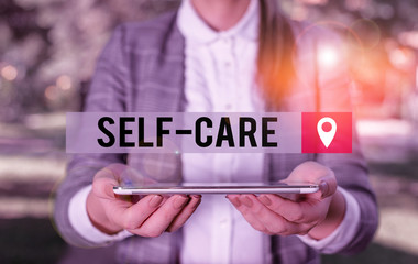 Writing note showing Self Care. Business concept for the practice of taking action to improve one s...