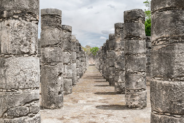 Fototapeta na wymiar Thousand columns structure - Mayan ruins featuring carved pillars at Chichen Itza archaeological site.