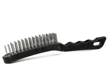 Steel wire brush with handle from black plastic for cleaning and polishing hard or metal equipment, isolated on white background