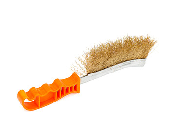 Brass wire brush with handle from orange plastic for cleaning and polishing hard or metal...