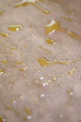 Baking domestic rolls with cheese. Putting cheese on dough for rolls