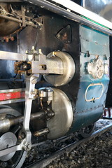Fototapeta premium Bangkok,Thailand-December 5, 2019: Driving wheels and coupling rods on a steam locomotive made in Japan